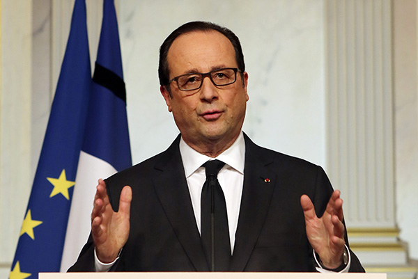 epa04552723 French President Francois Hollande addresses the nation at the Elysee Palace in Paris, France, 09 January 2015. With explosions and gunfire, security forces ended a three-day terror rampage around Paris, killing the two al-Qaida-linked brothers who staged a murderous rampage at a satirical newspaper, and an associate who seized a Hyper Cacher supermarket to try to help them escape.  EPA/REMY DE LA MAUVINIERE / POOL  MAXPPP OUT