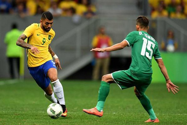 Jogo entre as seleções do Brasil e do Iraque pela primeira fase do futebol olímpico, no Estádio Mané Garrincha