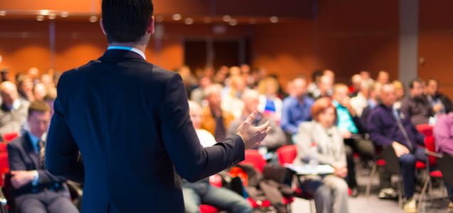 Speaker at Business Conference and Presentation. Audience at the conference hall.